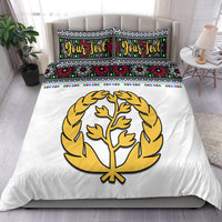 White duvet cover set with gold tree in circle and Eritrean-style cross pattern