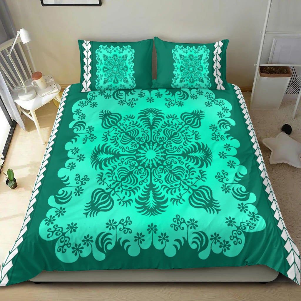 Teal floral mandala duvet set with two green pillows and patterned side trim