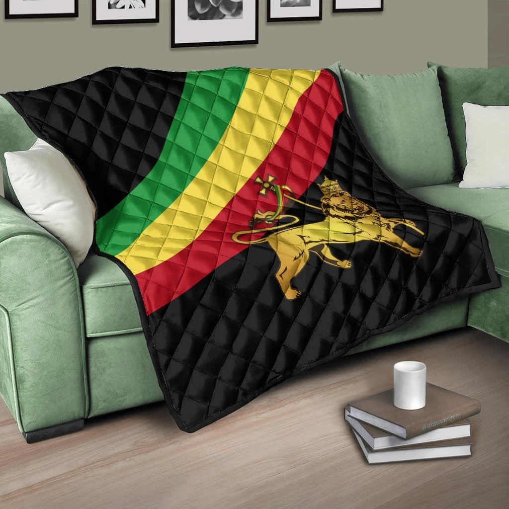 Ethiopia flag quilt: black quilted diamonds with green, yellow, red diagonal stripes