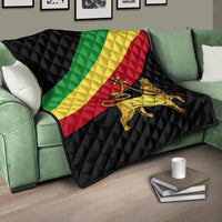Ethiopia flag quilt: black quilted diamonds with green, yellow, red diagonal stripes