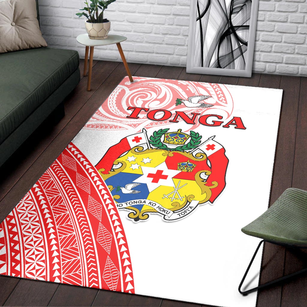 White Tonga area rug with red geometric border and central coat-of-arms emblem