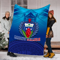 Blue Manu Samoa blanket featuring shield crest and white “MANU SAMOA” wordmark