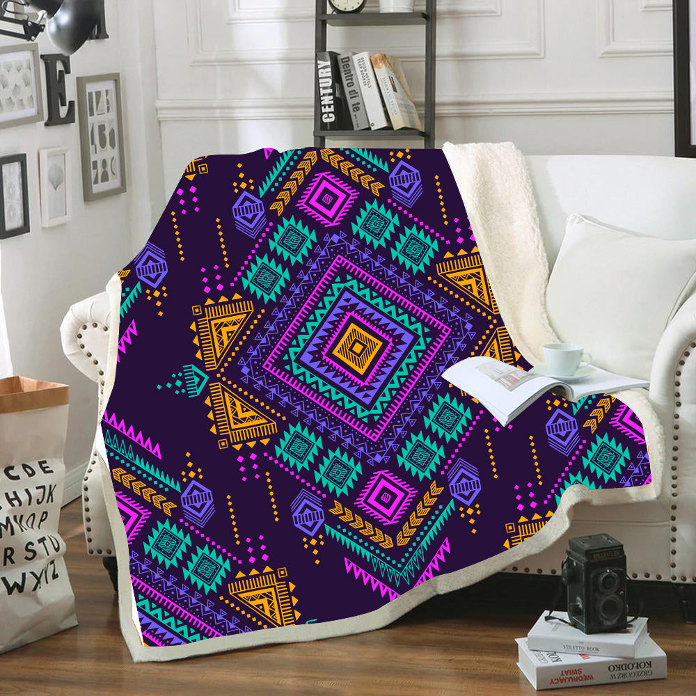Colorful tribal geometric blanket with purple, teal, pink, and yellow diamond motifs