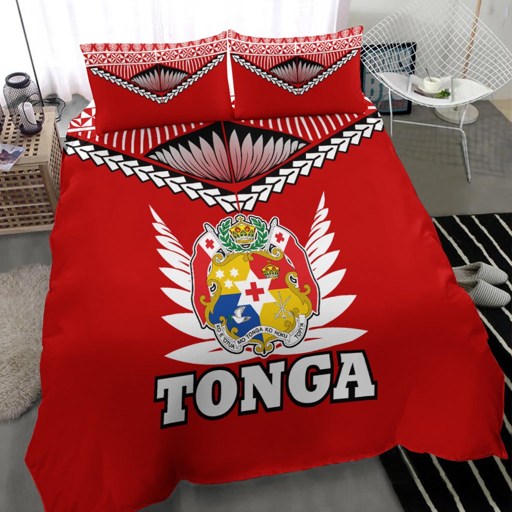 Red Tonga bedding set showing crest emblem, winged rays, and bold “TONGA” on duvet