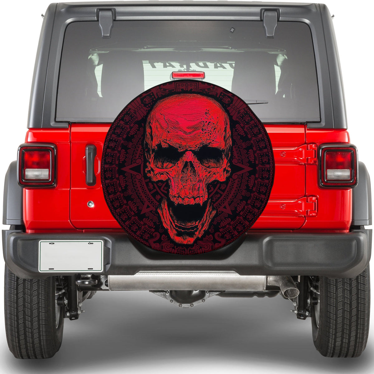 Spare tire cover with red skull graphic and dark Aztec-style border