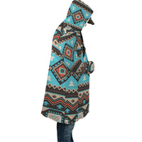 Side view hooded cloak with multicolor geometric print and draped sleeves
