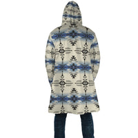 Back view hooded long cloak with seamless geometric pattern in blue/black/cream
