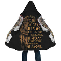 Back hooded cloak close-up with wolf feather design and “LISTEN TO YOUR HEART” text