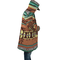 Multicolor hooded cloak, side view with bison print and tribal stripes