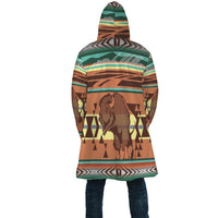 Back view hooded cloak with large bison emblem and geometric borders