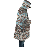Colorful tribal striped hooded cloak, side view with long draped back
