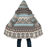 Colorful tribal striped hooded cloak, close view of hem and side tie