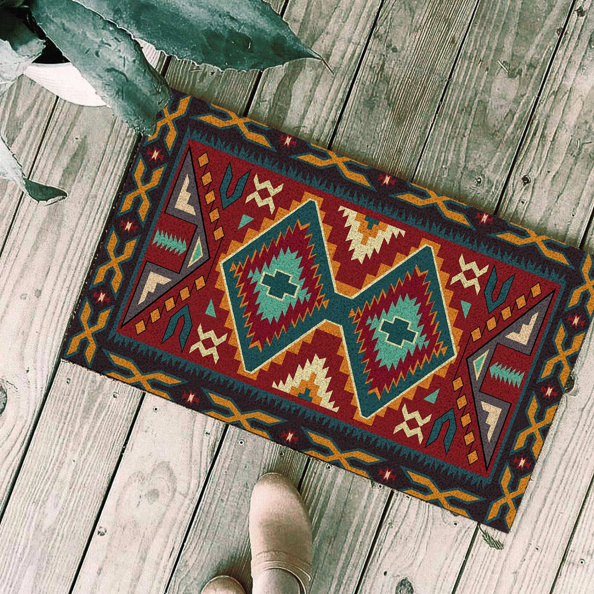 Multicolor geometric doormat with zigzag border and diamond center motifs