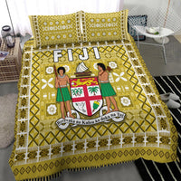 Yellow patterned bedspread with Fiji tapa print center, flanked by decorative borders