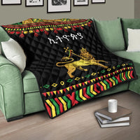 Ethiopian lion quilt, black with multicolor geometric border