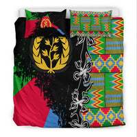 Black duvet and pillow set with colorful African print blocks, yellow tree/lion emblem