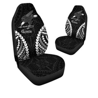Black car seat covers with eagle and Polynesian geometric patterns, front-seat pair