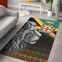 Black Jamaica area rug with roaring lion, green-yellow diagonal banner and geometric border