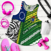 Green racerback tank laid flat with Polynesia print; assorted workout accessories nearby