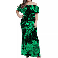 Off-shoulder maxi dress, dark green with clover and Polynesian-style tribal print