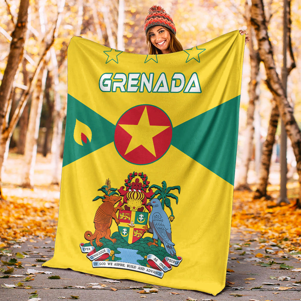 Grenada flag blanket draped outdoors in yellow and green with red star and coat of arms