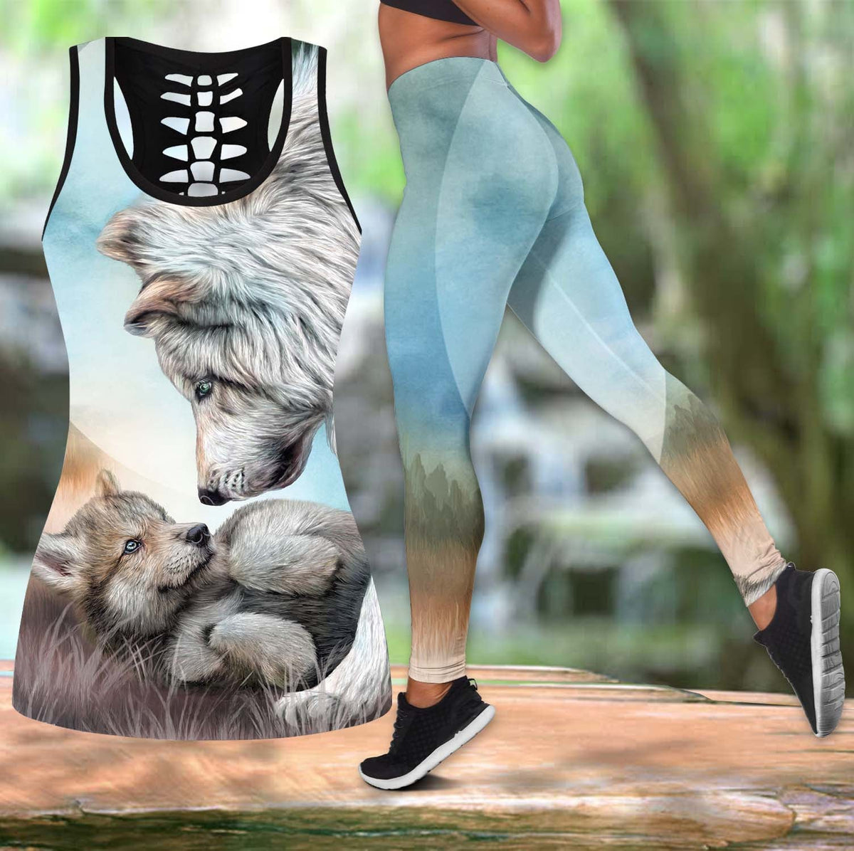 Black hollow-front tank top with wolf graphic and light blue leggings, two-piece set