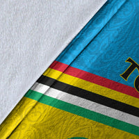 Close-up Torba blanket flag style fabric, blue and yellow with green-red stripes