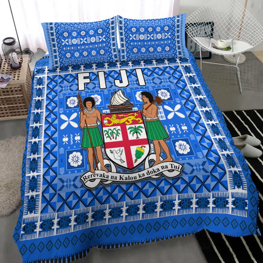 Blue Fiji tapa pattern bedding set, crest artwork and geometric borders visible