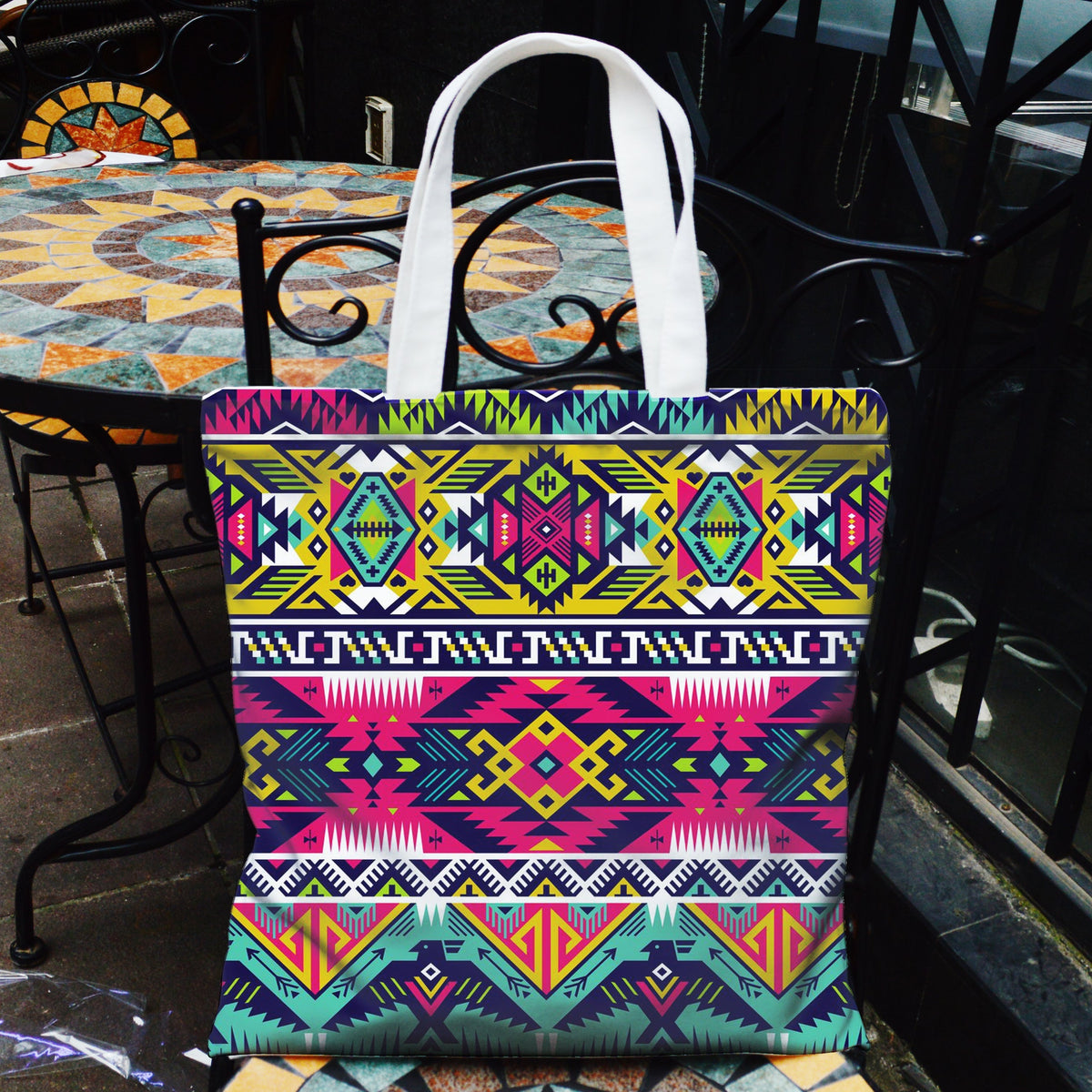 Multicolor Native-style geometric canvas tote bag with white handles