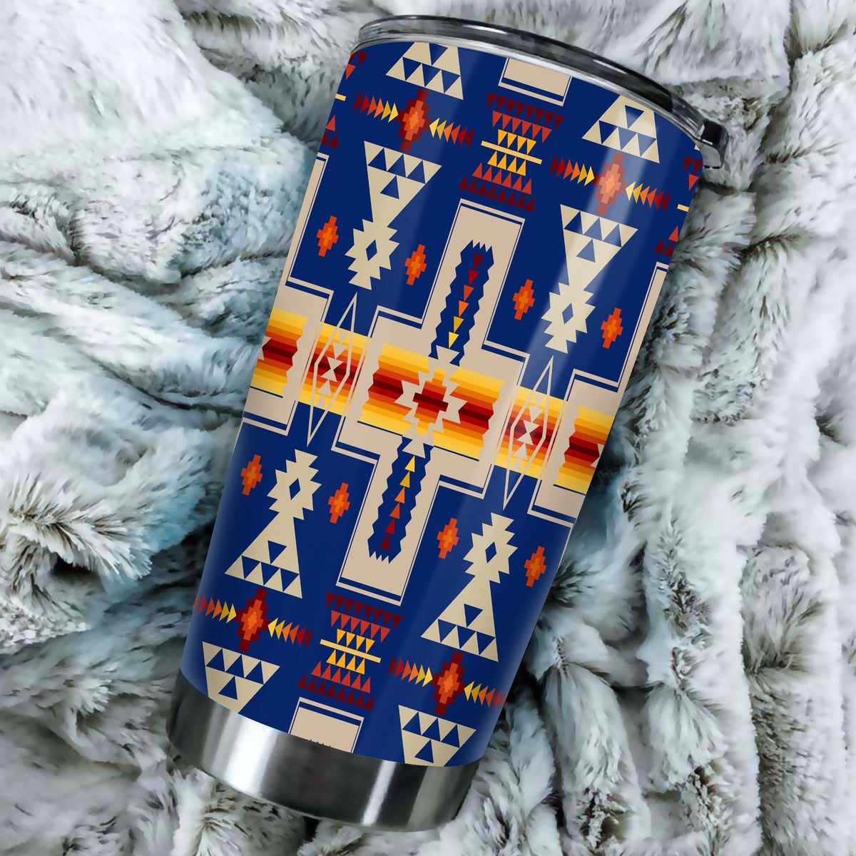 20oz navy tumbler angled view with Native American geometric pattern in multicolor