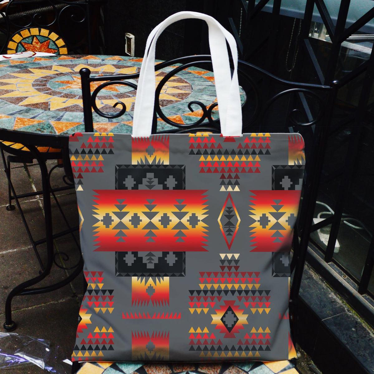 Multicolor geometric canvas tote bag, white handles, tribal pattern
