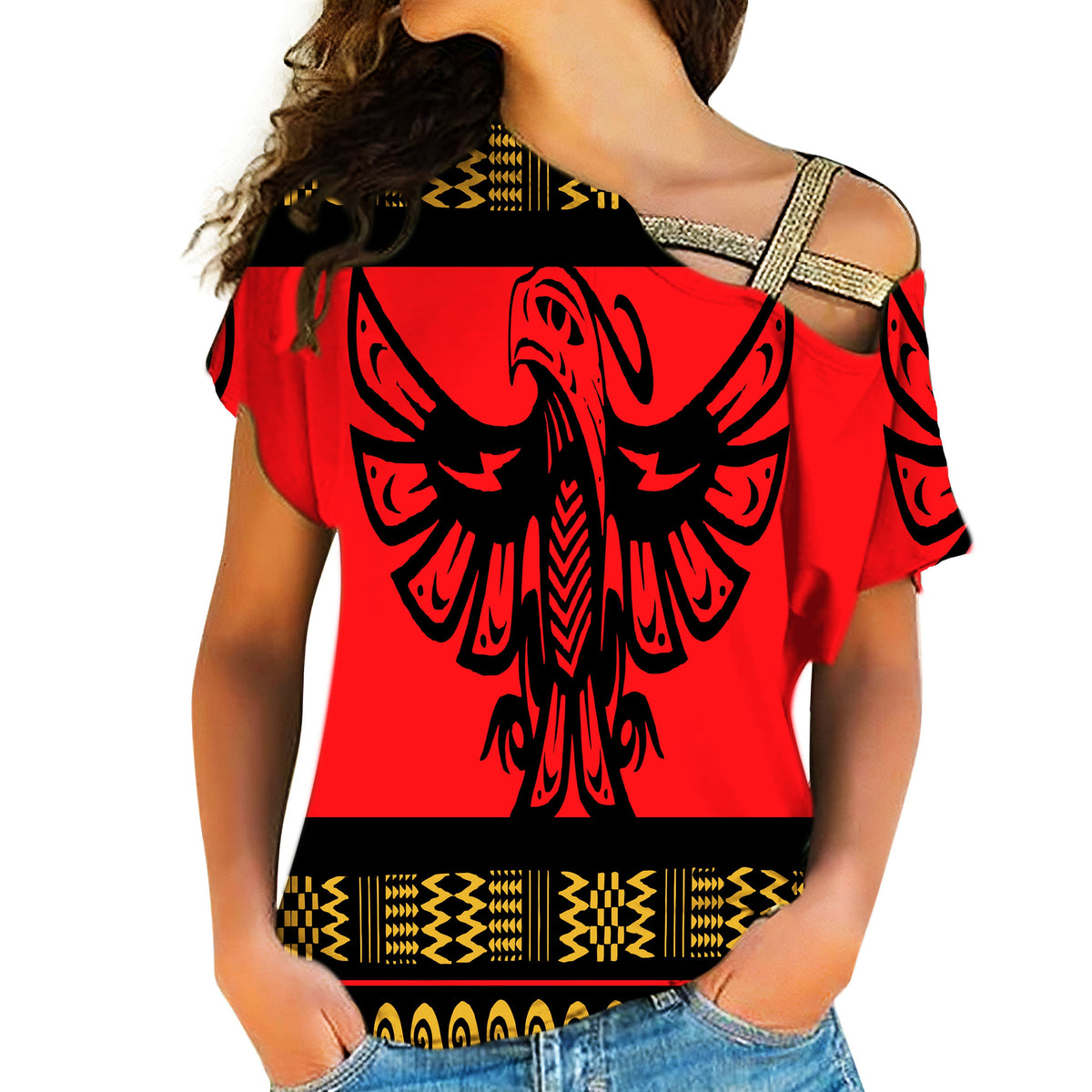Red cross-shoulder shirt, black phoenix graphic with patterned yellow trim