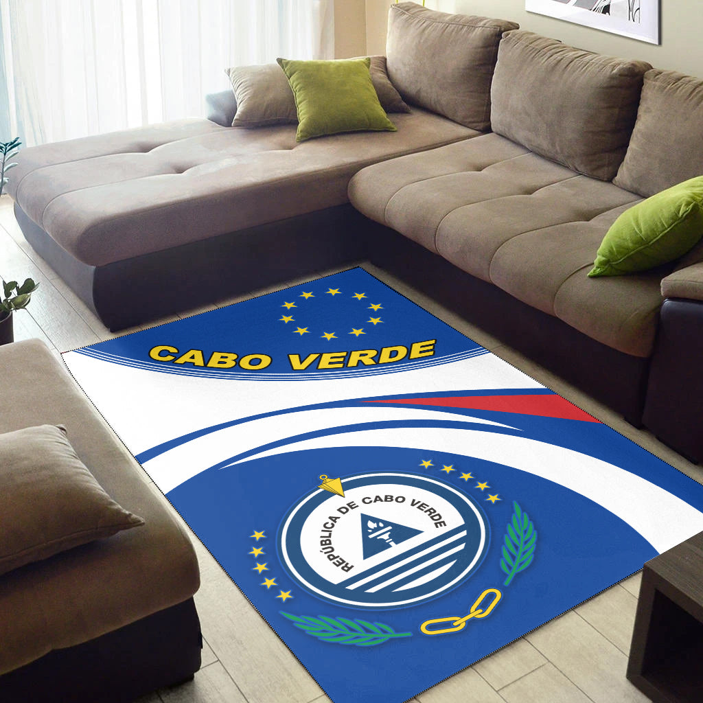 Blue Cabo Verde rug with EU-style stars, central seal, and sweeping white stripes