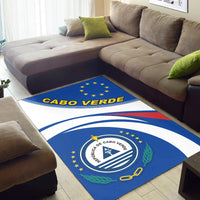 Blue Cabo Verde rug with EU-style stars, central seal, and sweeping white stripes