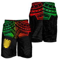 Men’s Polynesian turtle heart swim shorts, front and back view in black with green/red