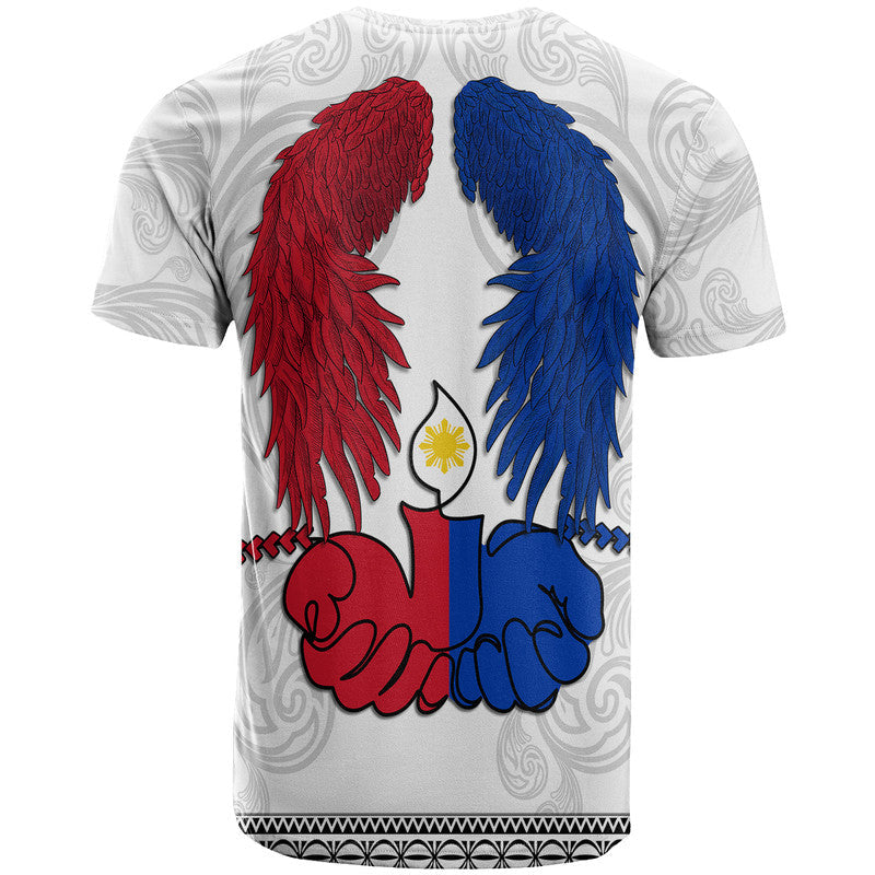 White T-shirt: red and blue angel wings with clasped hands graphic