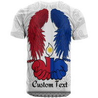 White crewneck T-shirt, back graphic with red and blue wings, praying hands, “Custom Text”