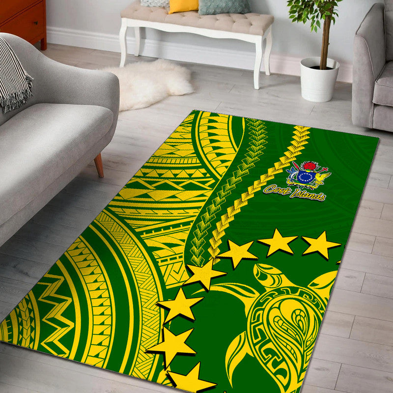 Green Polynesian area rug with yellow tribal patterns, stars, and wave motifs