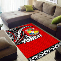 Red rug with Tonga crest, Polynesian tattoo swirls, and bold “TONGA” lettering in black/white