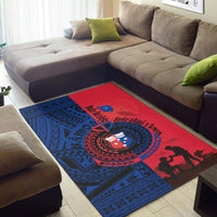 Blue geometric and red panel area rug with circular emblem, cross, and bold silhouettes