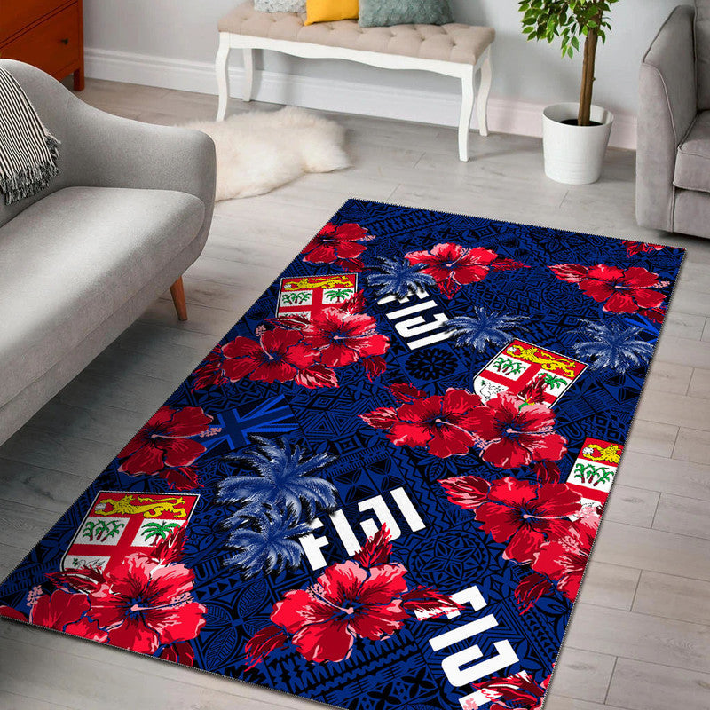 Blue area rug with red hibiscus and palm motifs, Hawaiian pattern for living room