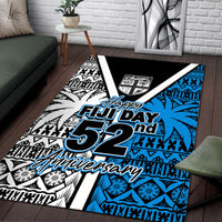 Area rug featuring "Happy Fiji Day 52nd Anniversary" in blue and white with black motifs