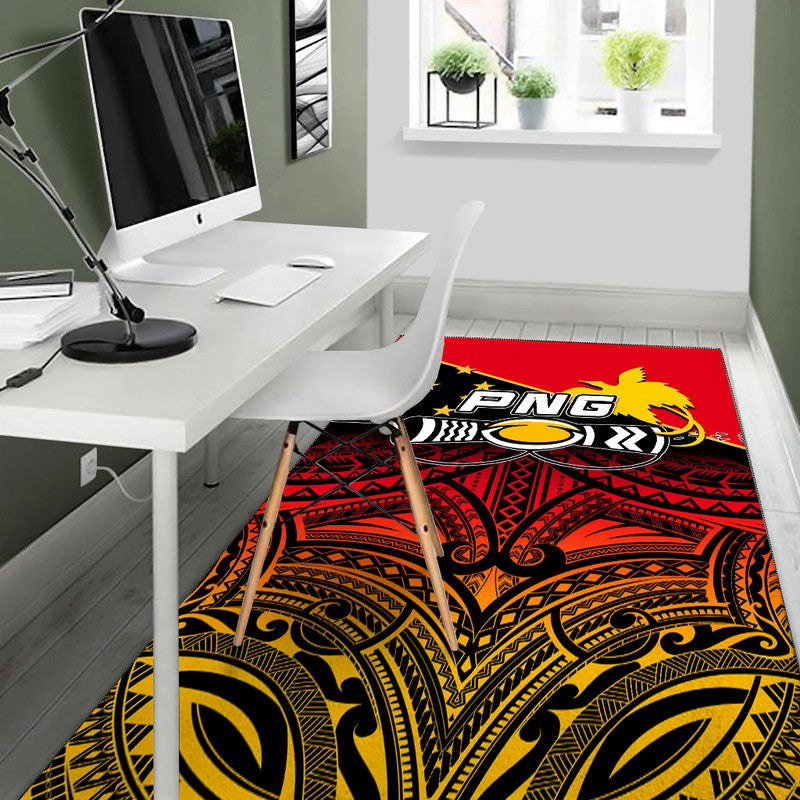 Red rugby area rug with PNG lion logo and tribal artwork in black and yellow