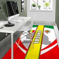 Senegal area rug with emblem and vertical Senegal text stripe in green and yellow
