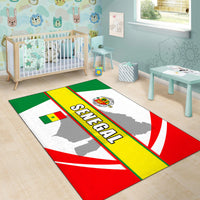 Senegal area rug with map silhouettes and red, green, and yellow border stripe