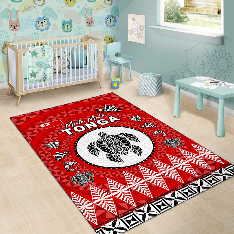 Red Tonga area rug for nursery with white oval emblem and patterned border