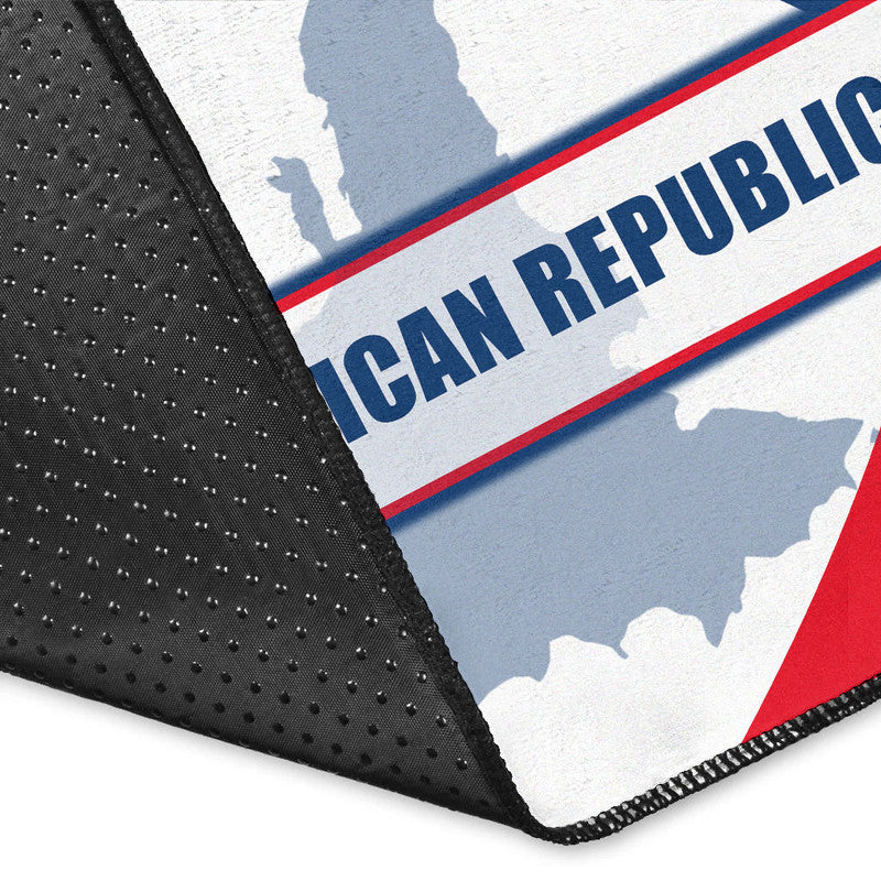 Black-edged area rug corner with Canada-themed text CAN REPUBLIC on blue and red stripe
