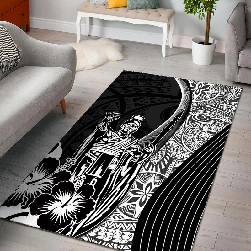 Black and white Hawaiian-style area rug with central warrior figure and floral patterns
