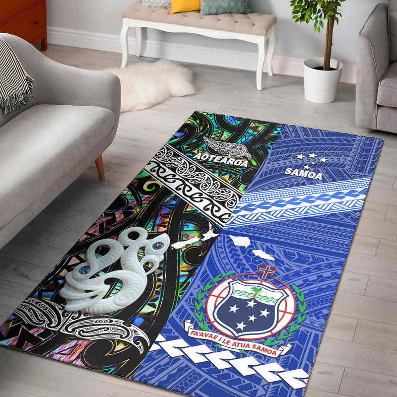 Area rug with colorful Polynesian map designs, black and blue sections, seashell detail