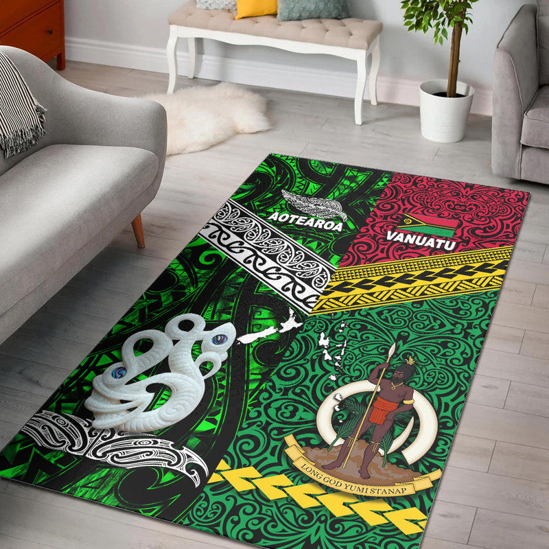 Green area rug with Aotearoa/Vanuatu tribal patterns and sea creature motifs